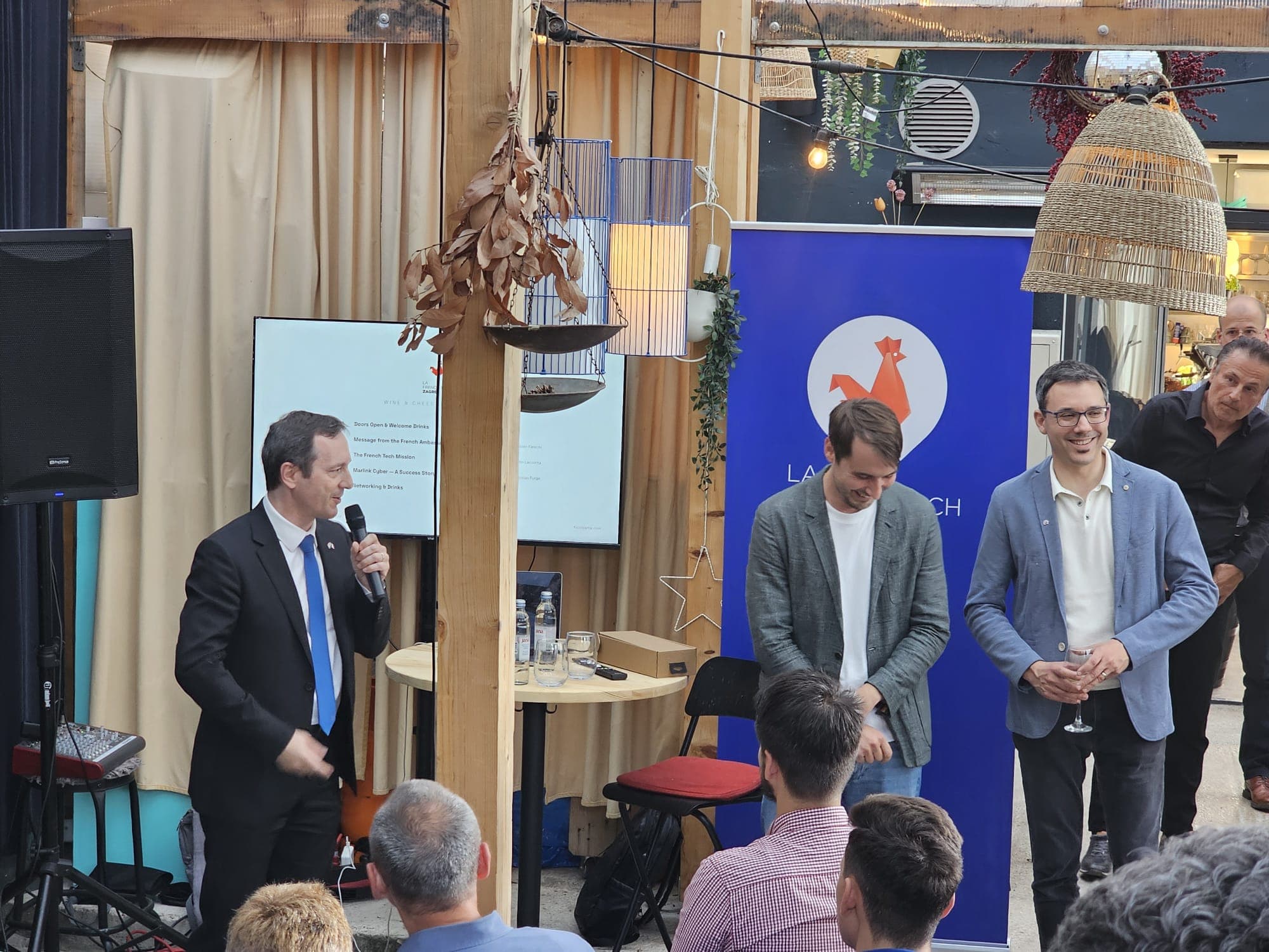 Ambassador Fieschi speaking with Quentin Lacointa and Guillaume Rabhi