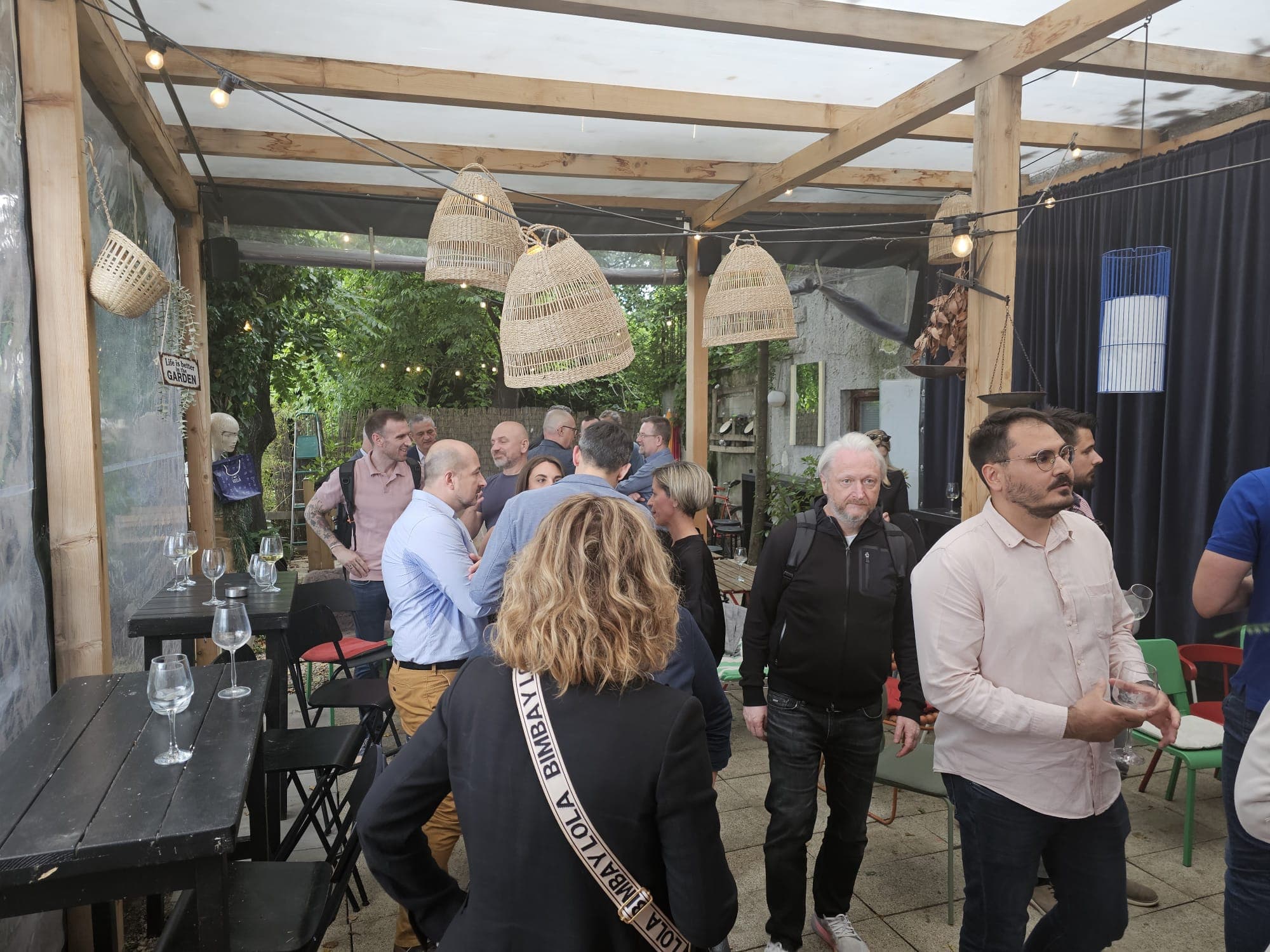 Attendees mingling on the terrace