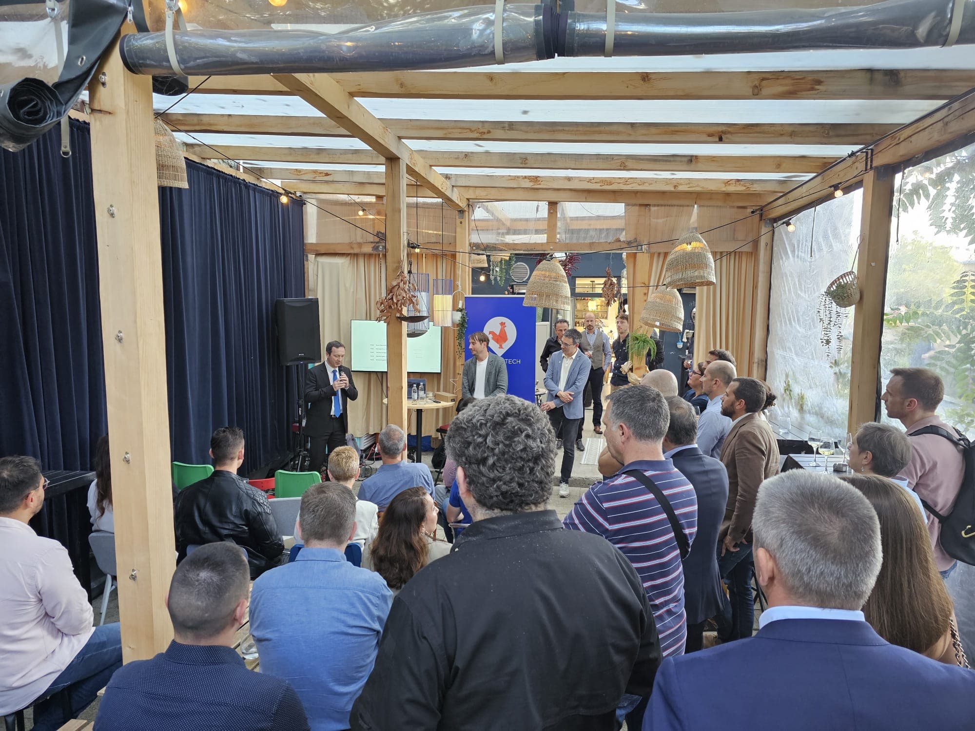 View from the back — full venue during presentations
